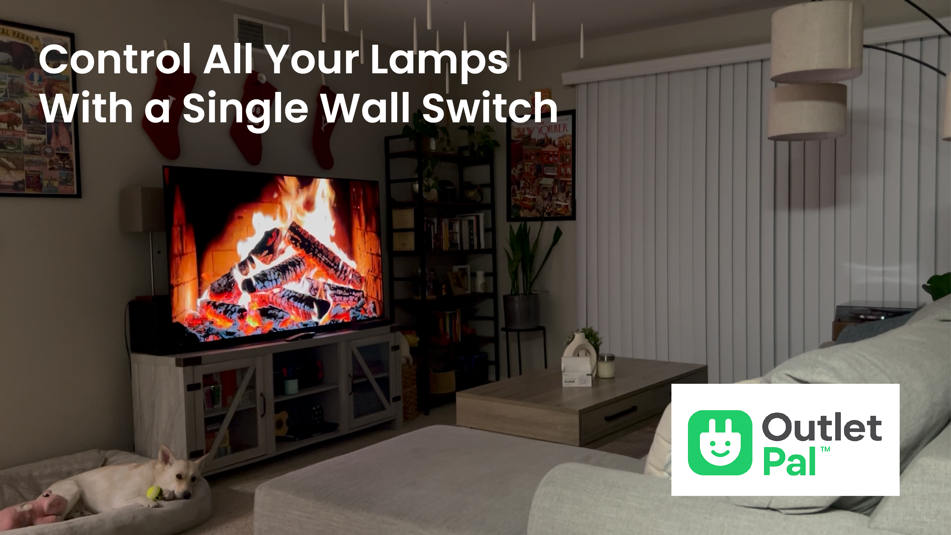 Living room with TV displaying a fireplace, Outlet Pal logo visible